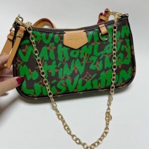 LV Graffiti Chain Handbag on The Little Yellow App. Look Expensive, Shop Smart