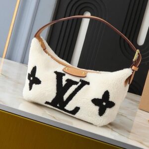 LV Sherpa Handbag only on The Little Yellow App. Look Expensive, Shop Smart.